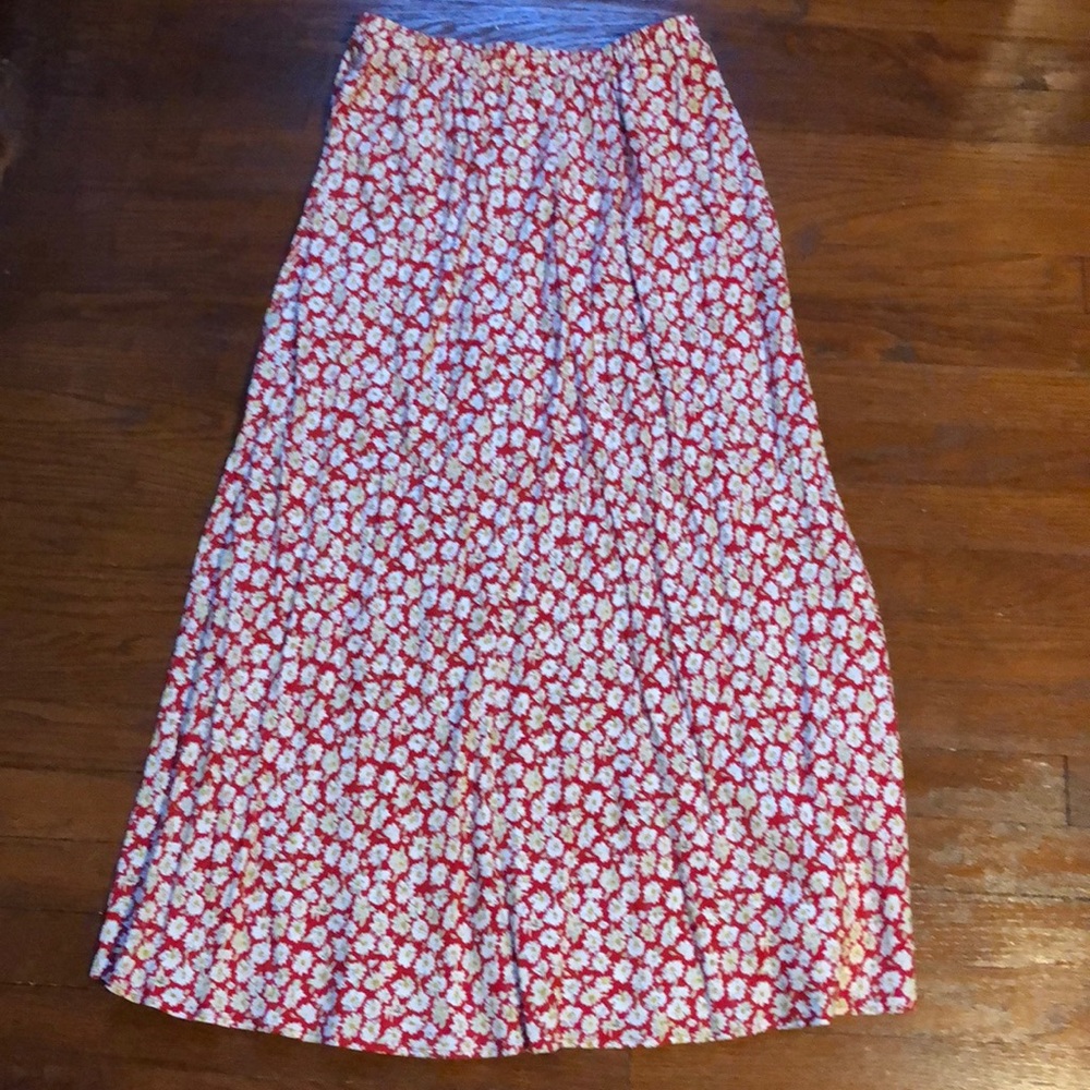 a red shirt with white flowers. worn once.